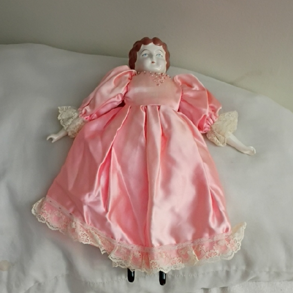 Tudor Porcelain Head Doll in Pink Satin Dress